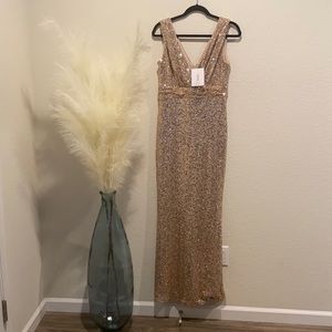 New with tags. Purchased for a wedding never worn